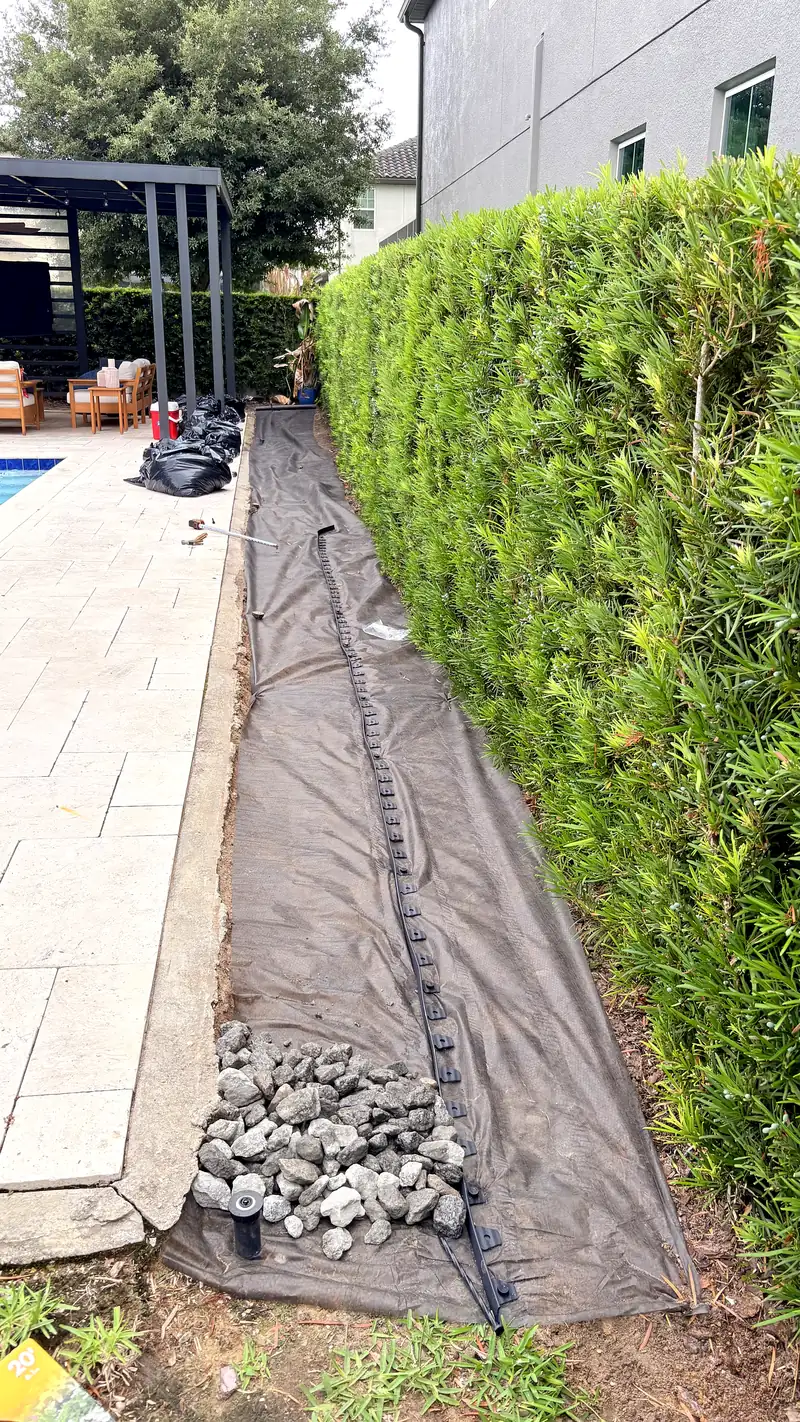 Landscape fabric and drip line installed